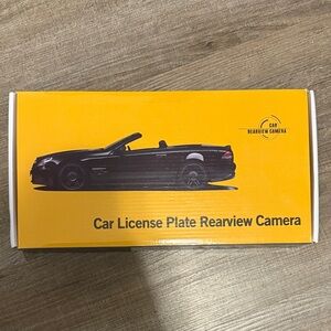 Sleek Black Car License Plate Rearview Camera
